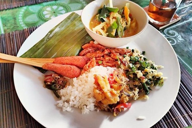 Afternoon Cooking Class & Making Bali Offering with Dinner - Cold ginger tea and the Canang Bali offering ritual