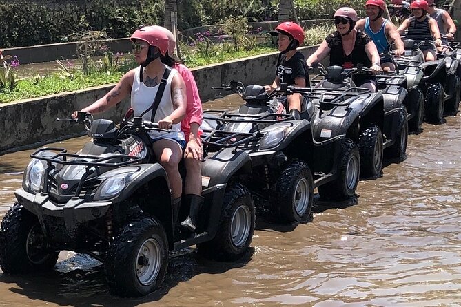 Bali ATV Quad Bike Through Tunnel, Waterfall, White Water Rafting - ATV quad biking: rice fields, tunnels, canyons, and a waterfall stop
