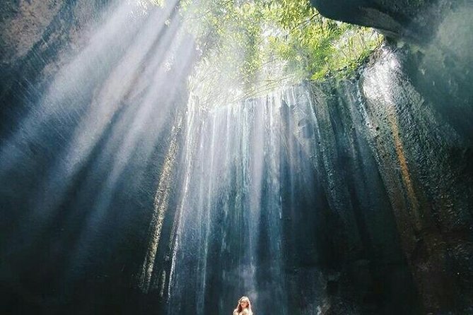 Bali best waterfall - Tukad Cepung: A Cliff-Walled Waterfall with a Light Show