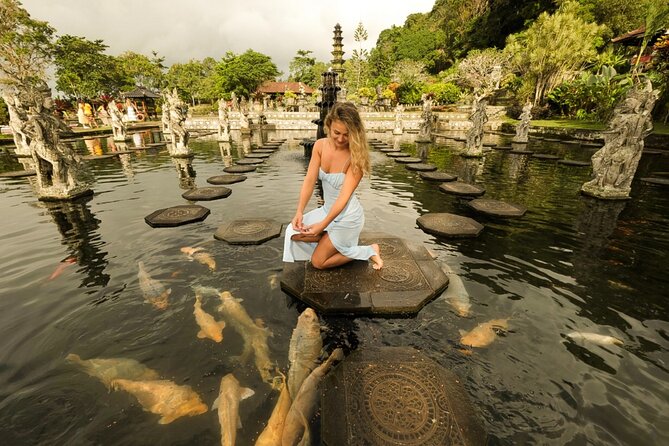 Bali Instagram Tour: Gate of Heaven, Swing and Waterfall Day Tour - Tukad Cepung waterfall: the cave walk makes it feel special