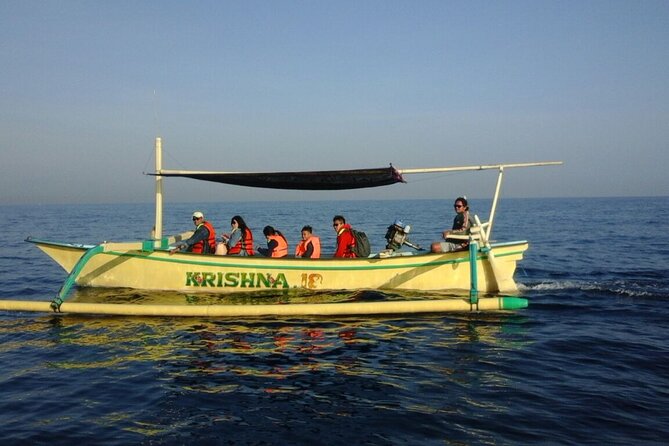 Bali Lovina Dolphin and North Bali Sightseeing - All Inclusive - Traditional Boat Ride at Sunrise: What to Expect on Calm Water