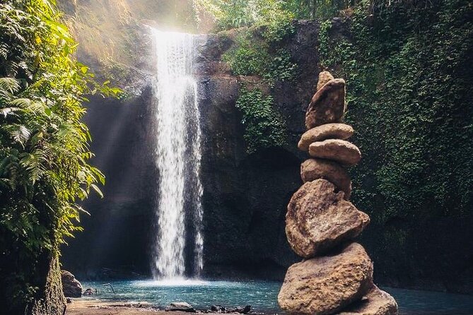 Bali: Ubud Highlights Tour with Private Guide and Transfers - Stop 2: Tibumana Waterfall, a 20-metre drop with a local spiritual story