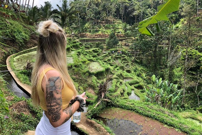Best of Ubud Private Day Tour with All Inclusive - Stop 3: Puseh Batuan Temple and those striking black palm details