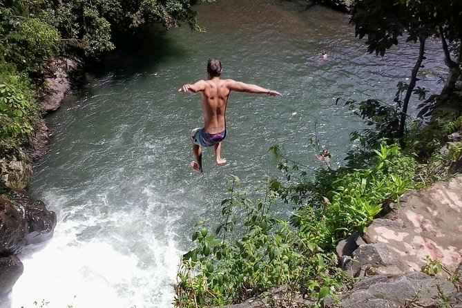 Cliff Jumping and Sliding at Aling Aling Waterfall - Cliff jumping and rock sliding at Aling-Aling: the main event