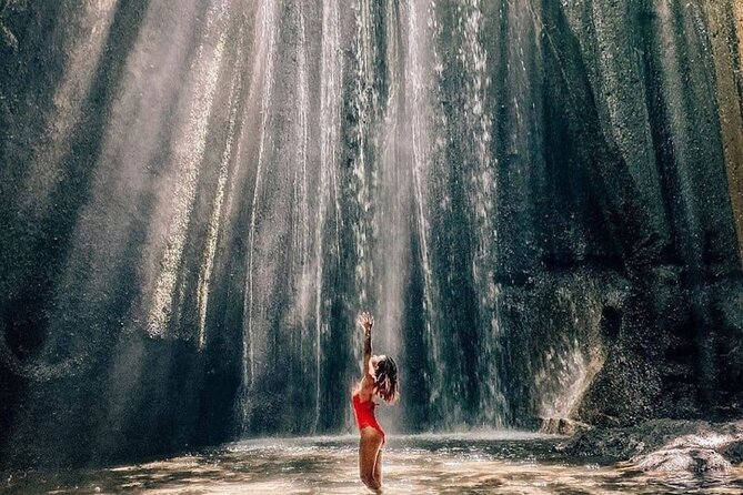 Discover the best waterfalls in Ubud and rice terraces tour - Tukad Cepung Waterfall: the hidden valley walk and light shafts