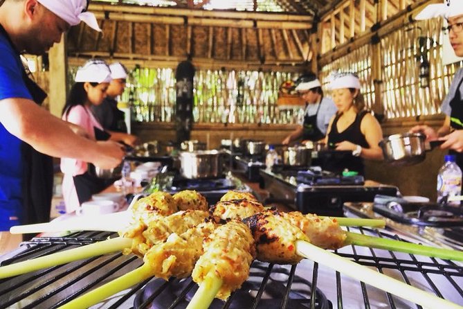 Exclusive Authentic Balinese Cooking Class at Family home - Entering a Balinese compound kitchen, where you actually cook