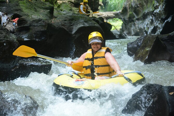 Full Day ATV Quad Bike and River Tubing Experience in Bali - River tubing on Bali’s smaller-feel tubes