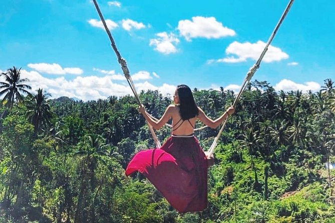 Jungle Swing - Volcano - Water Temple - Monkey Forest and Waterfall Tour - Tirta Empul Temple: holy springs and the feel of everyday spirituality