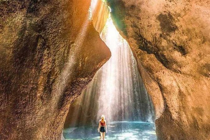 Kintamani and Tukad Cepung Waterfall Tour - Tukad Cepung Waterfall: Rock Walls, Water Light, and a Short Adventure
