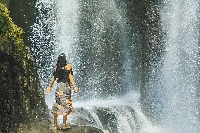 Melukat - The Purification Ceremony at Tirta Empul Temple - Tukad Cepung Waterfall: the cave-light moment and the wet route