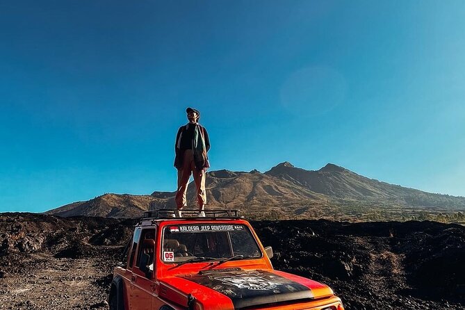 Mount Batur Jeep Sunrise Tour - Kintamani after sunrise: lava fields and the black lava stop