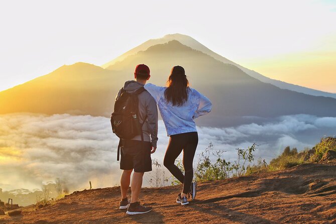 Mount Batur Sunrise Trekking - All Inclusive - Summit sunrise at Mount Batur: clouds, volcanic views, and that egg breakfast