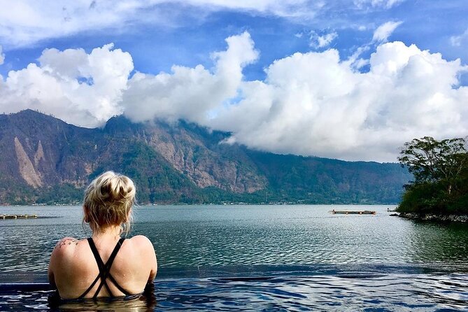 Mount Batur Sunrise Trekking and Natural Hot Spring Tour - At the Summit: Sunrise Waiting With a Purpose