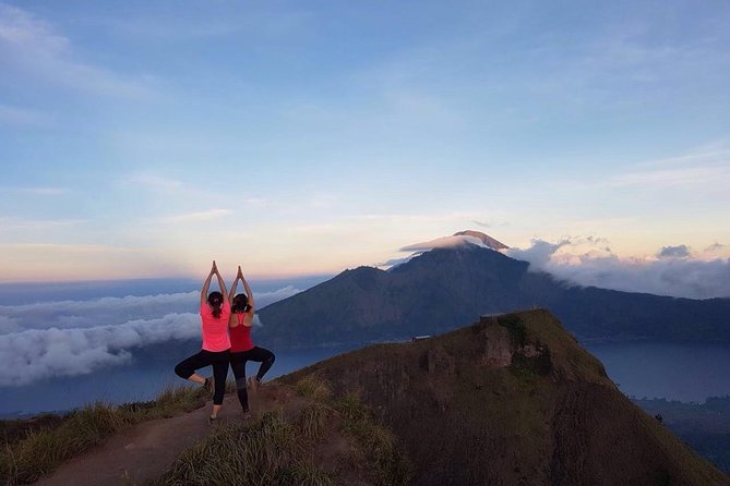 Private Mount Batur Sunset Trekking - All inclusive tour - The climb itself: guides, walking sticks, and volcanic footing