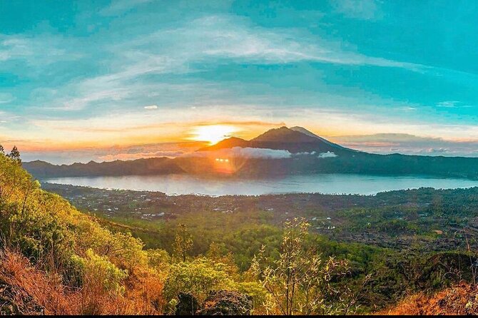 Sharing Mount Batur Sunrise Trekking Guide Pick Up and Drop Off - What to wear and bring for slippery volcanic footing