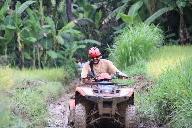 Ubud ATV Quad Bike with Ayung River Rafting Experience - Rice field tour after the action: countryside views you can slow down for