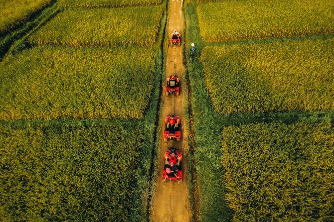Ubud ATV Ride through River Jungle Rice Fields Puddles - The photo and guide factor: why people remember the ride, not just the mud