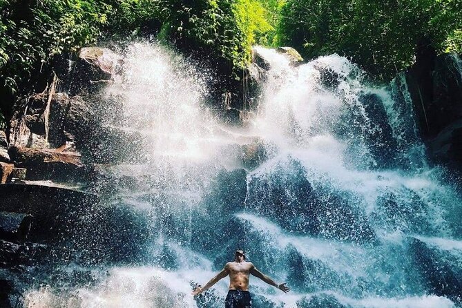 Ubud Customized Full Day Tour - Visit Most favorite In Ubud - Stop 3: Kanto Lampo Waterfall and Choosing How Wet You Want to Be