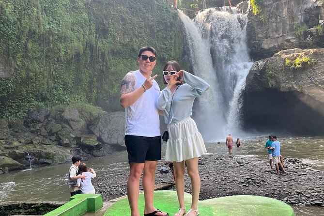 Ubud Private Chasing Waterfall and Water Temple Tour - Stop 1: Tegenungan Waterfall for a real swim and classic Bali photos