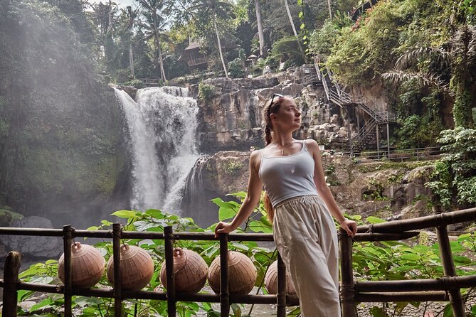 Ubud Tour Waterfall Rice Terrace Temple and Art Village - Stop 1: Tegenungan Waterfall, the swim-and-photo break