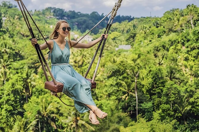 Ubud Tour with Monkey Forest Waterfalls Temples and More - Stop-by-stop: Tirta Empul Temple and the holy springs purification ritual