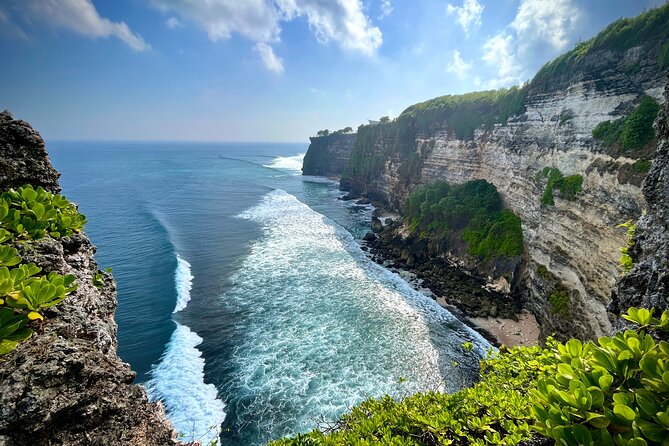 ️Uluwatu Temple Sunset & Kecak Fire Dance Tour - Stop 1, Padang Padang Beach: famous surf energy with an easy 1-hour break